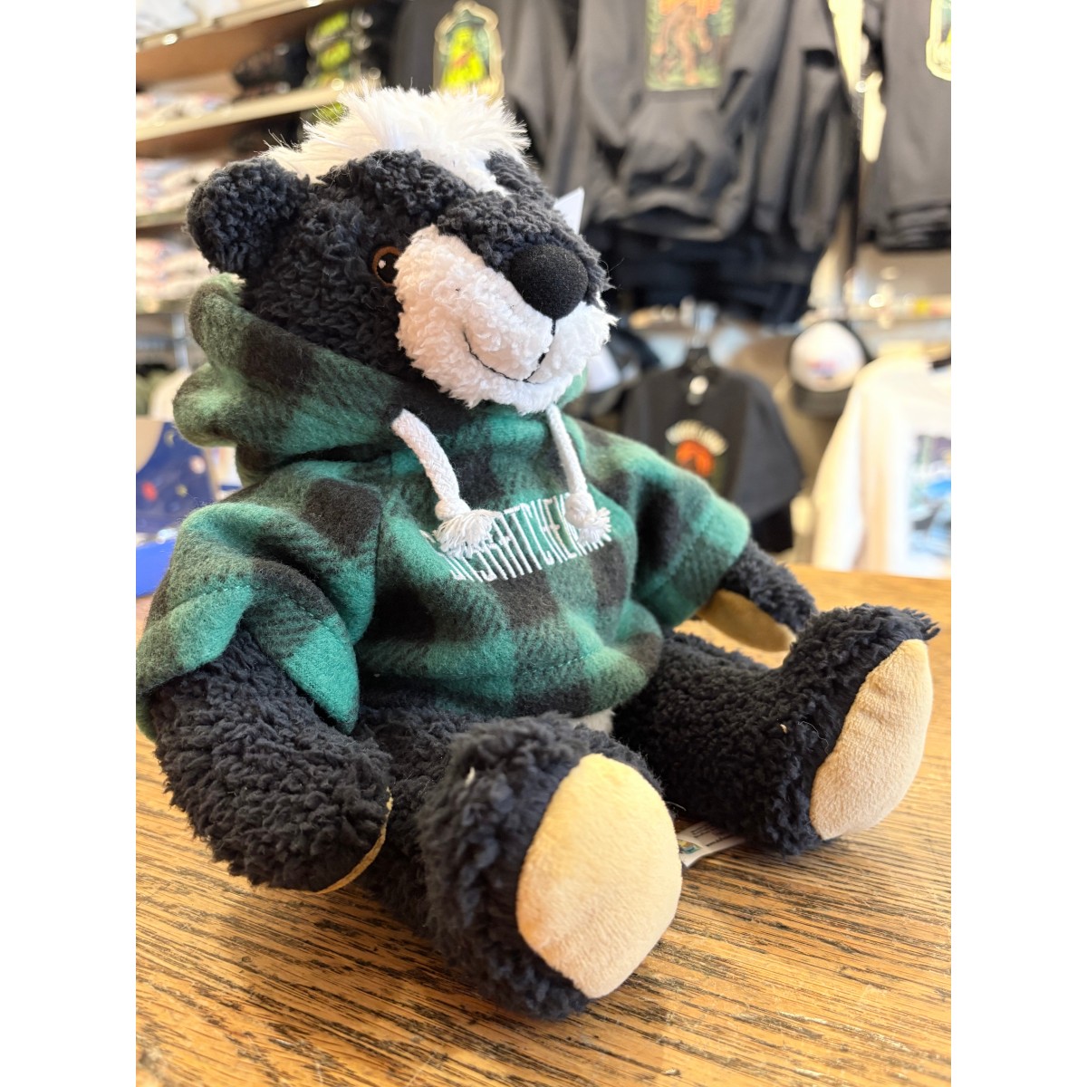 Stuffed 10" Curly Critter Skunk with Green Jack Embroidered Saskatchewan Hoodie