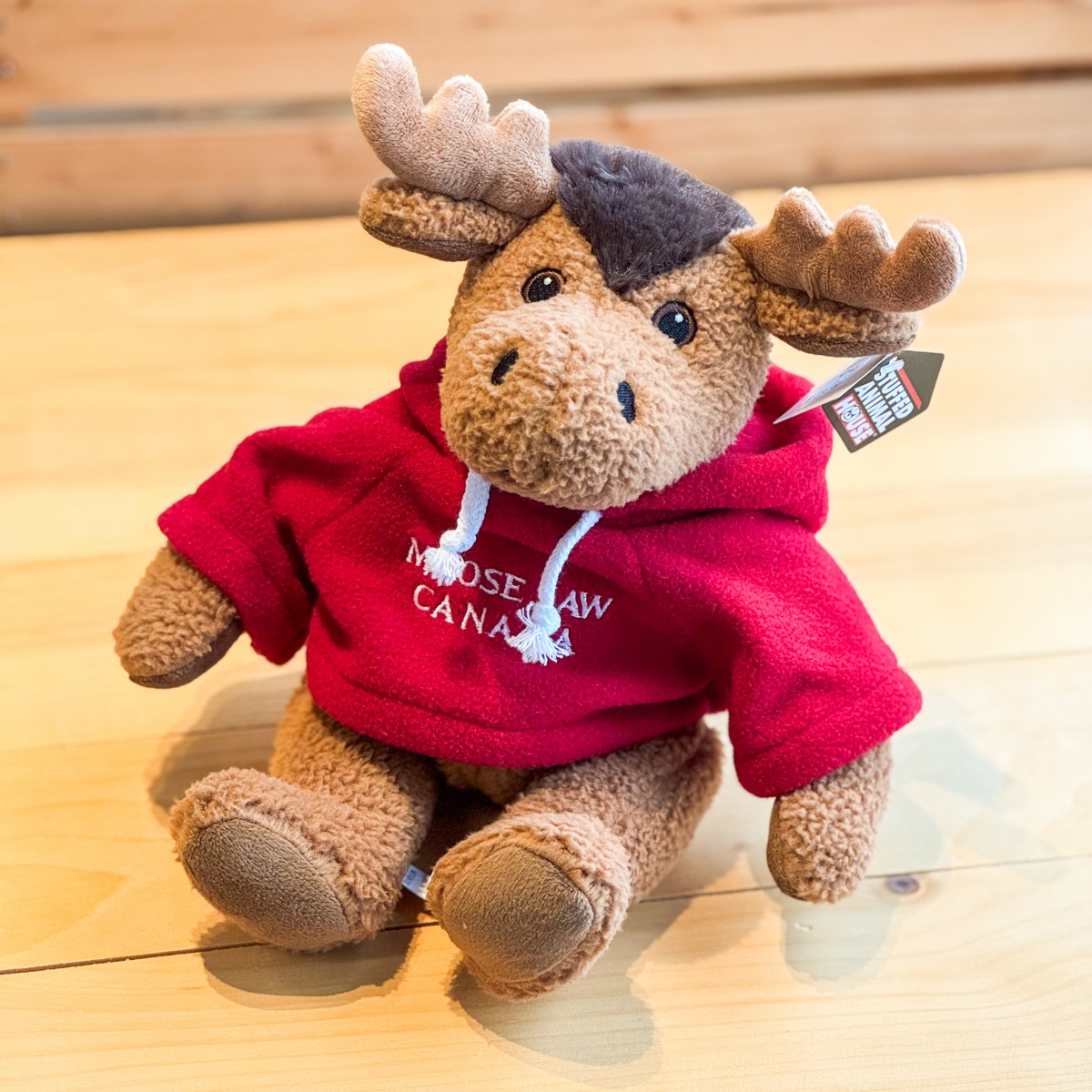 Stuffed 10" Curly Critter Moose With Red Embroidered Moose Jaw Hoodie